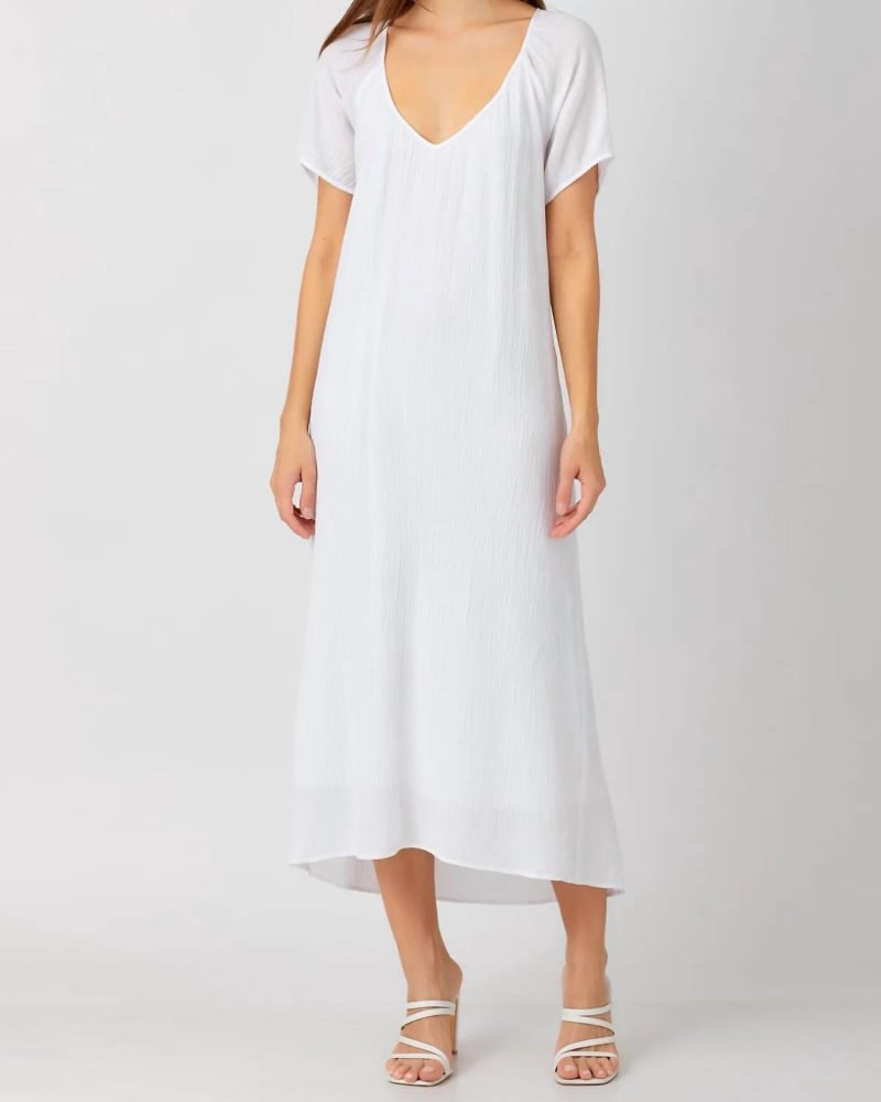 Front of a model wearing a size L Midi Dress in Black in Black by maven west. | dia_product_style_image_id:335365